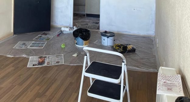 Laminate flooring being fitted by M + G Property Solutions